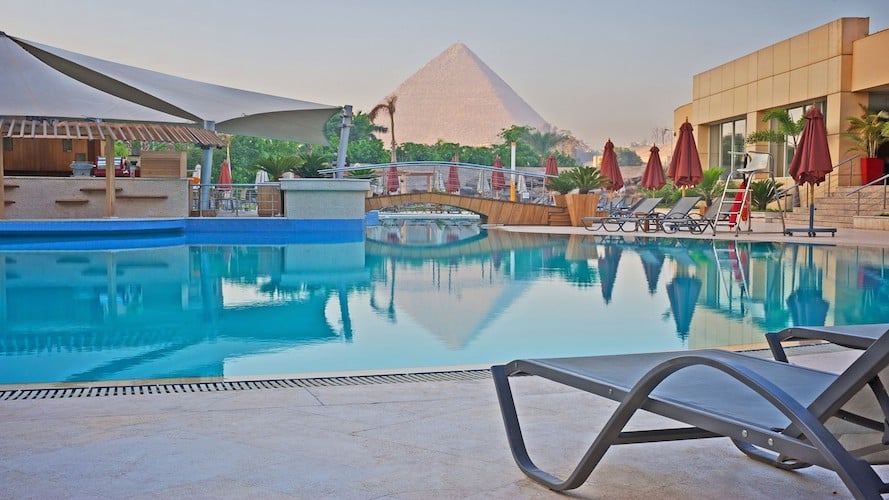 Pool with pyramid in background
