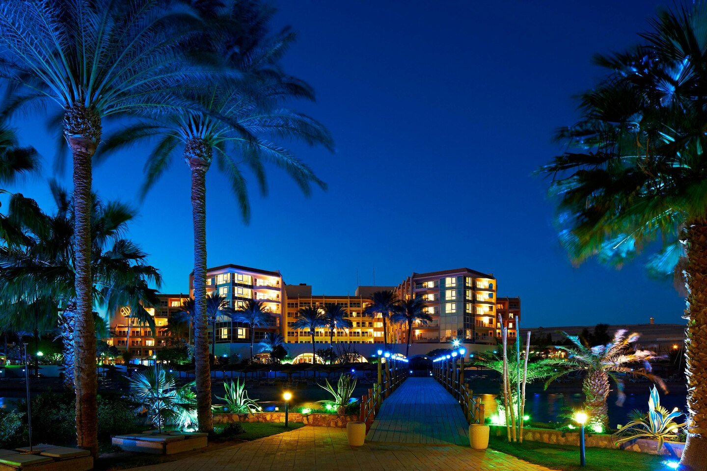 Hurghada Marriott Resort building reflecting in the Red Sea at night 