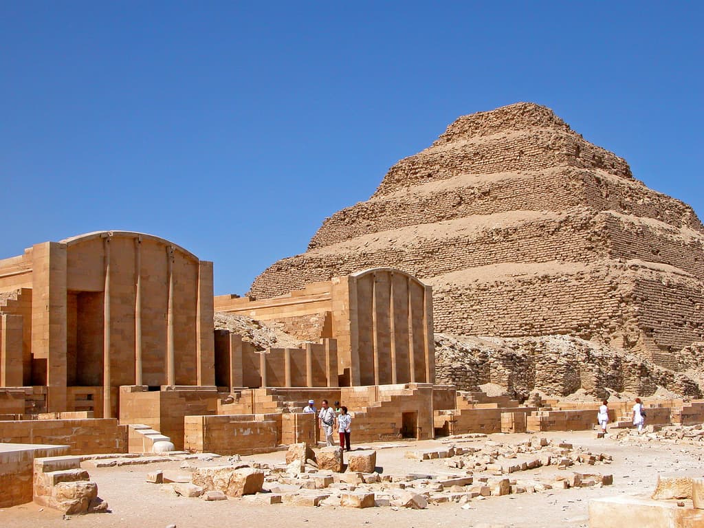 Ancient stone pyramid amidst desert—a guide to Arabic for your Nile cruise adventure.