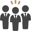 Three silhouetted figures in suits, with the highlighted leader symbolizing classic travel expertise.