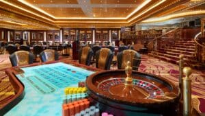 Luxurious Sheraton Cairo Casino with roulette, chips, and elegant lighting. Empty chairs await.