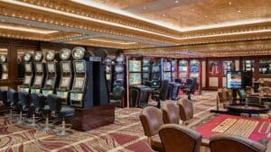 Sheraton Cairo Casino interior with slot machines, gaming tables, and no people present.