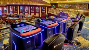 A row of gaming machines lights up the Sheraton Cairo Hotel & Casino interior.