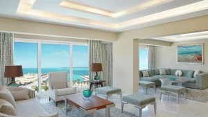 Spacious Hilton Hurghada living room with ocean view and elegant furnishings.