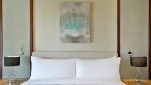 Stylish Hilton Hurghada room with double bed and two bedside lamps.