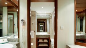Hotel-style bathroom with sink, mirror, hairdryer, and towels at Hurghada Marriott Beach Resort.