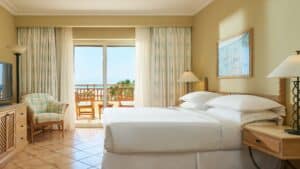 Room at Sheraton Soma Bay with a balcony and ocean view.