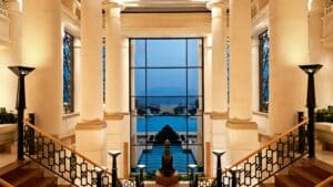 Sheraton Soma Bay lobby offers large windows with views of a pool and distant mountains.