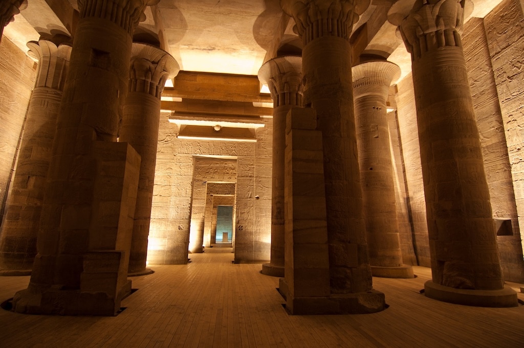 Columns at Temple of Isis on Philae Island in the night with lighting