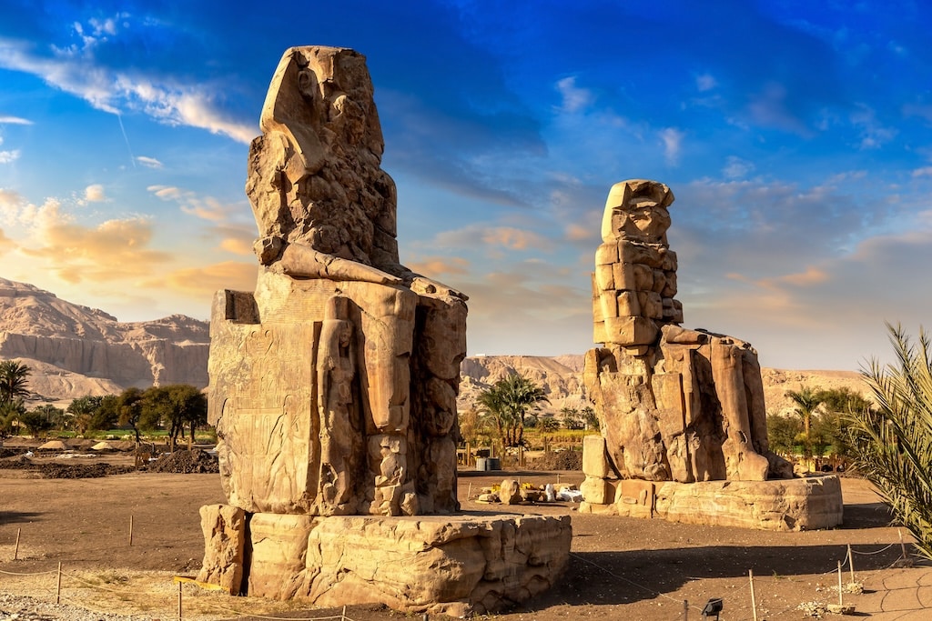 Colossi of Memnon in Luxor, Valley of Kings, Egypt in a sunny day