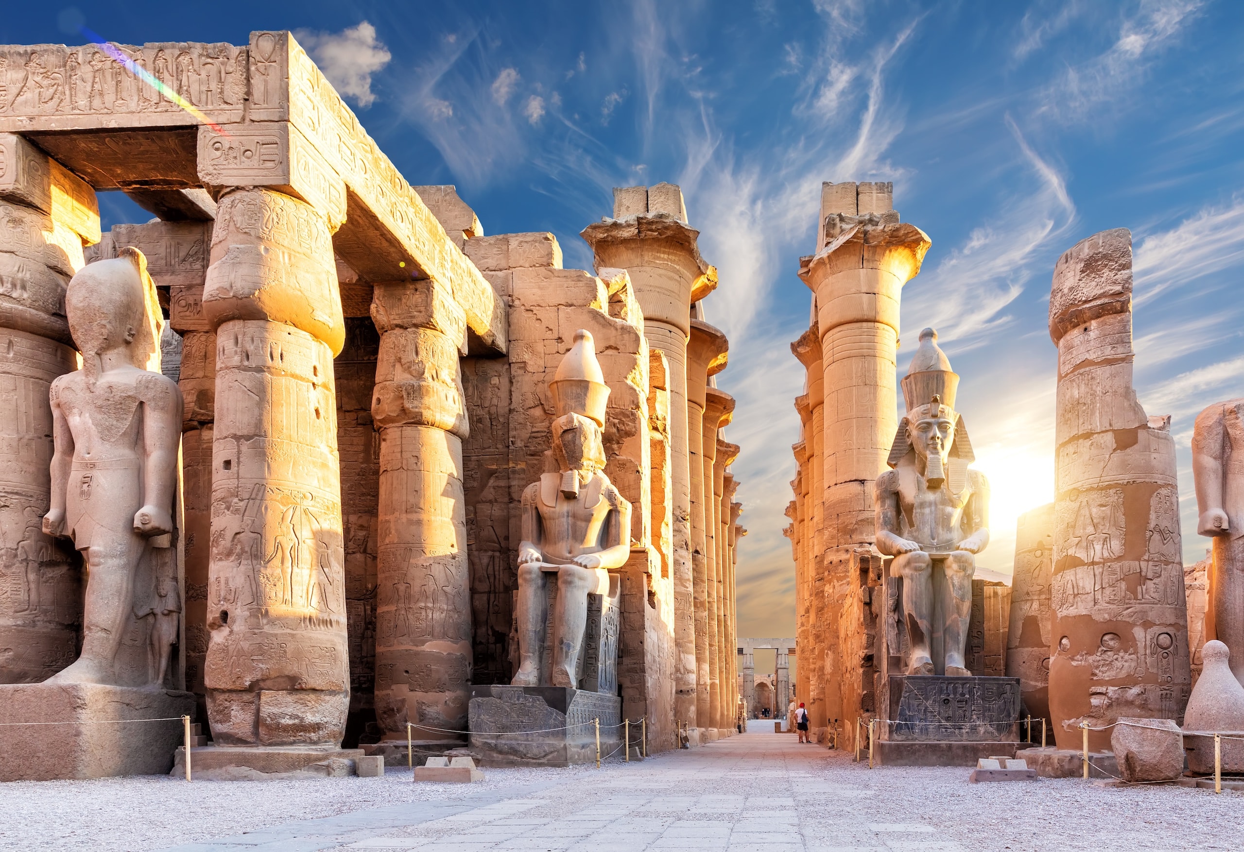 Columns and statues of the Luxor temple main entrance, first pylon, Egypt.