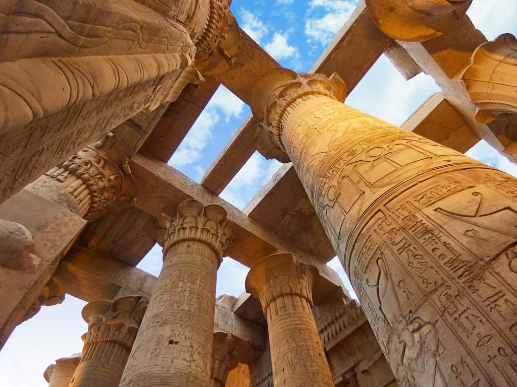 Ruins of the Temple of Kom Ombo in the Nile river at sunset, Egypt