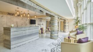 Cairo Marriott Spa: Marble decor, chairs, and soft lighting.