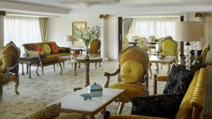 Luxurious sitting area at Cairo Marriott with elegant furniture and large windows.